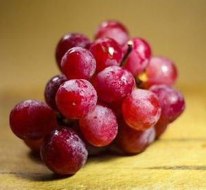 a bunch of red grapes