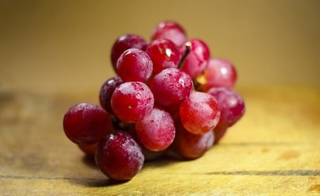 a bunch of red grapes